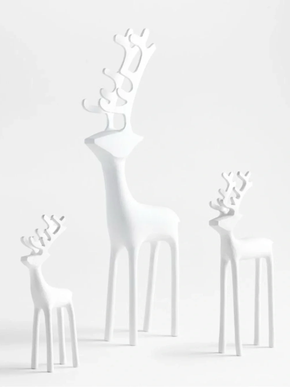 Set of Crate and Barrel White and Black Metal Reindeer